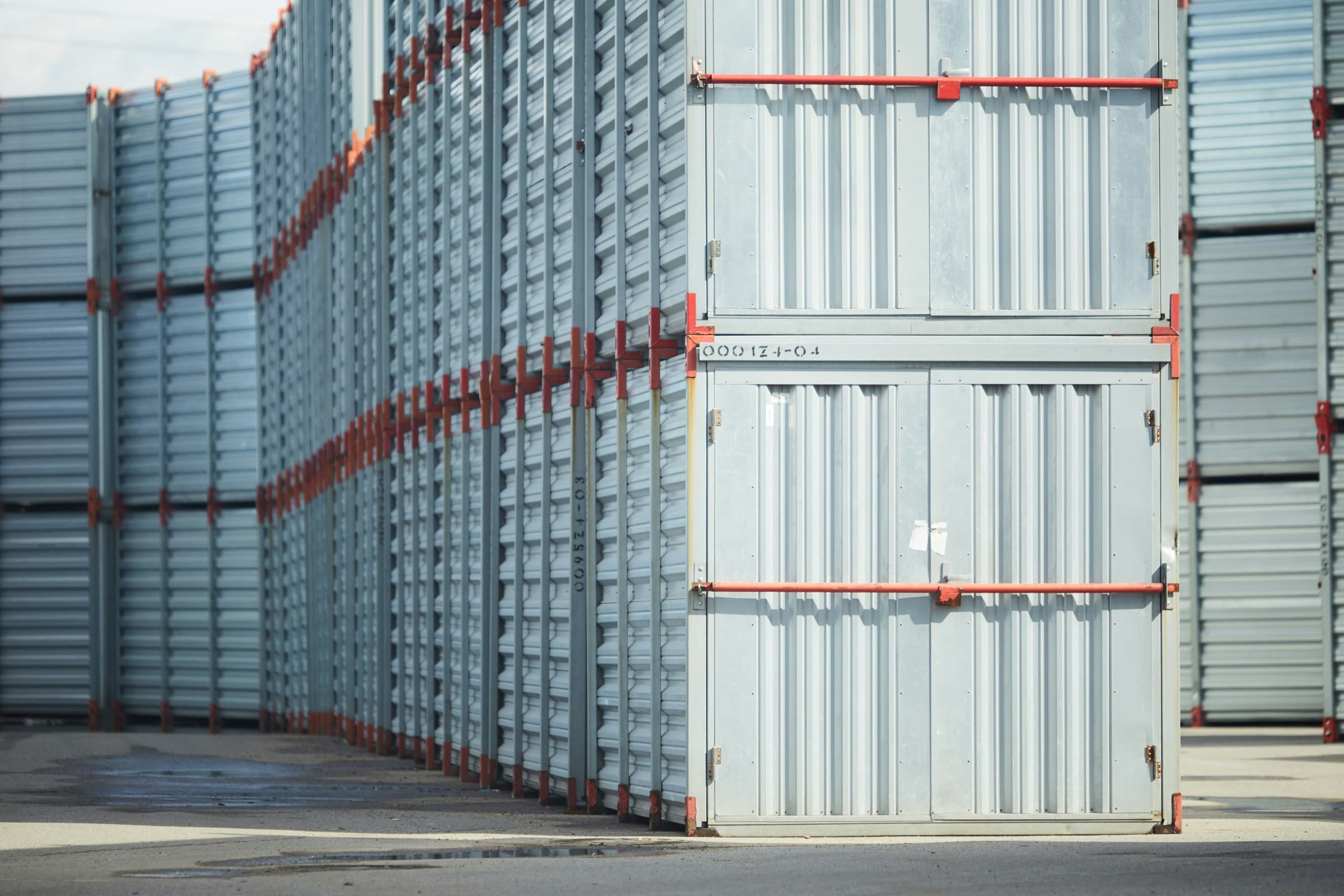 Commercial yard storage containers arranged for exterior camera coverage planning